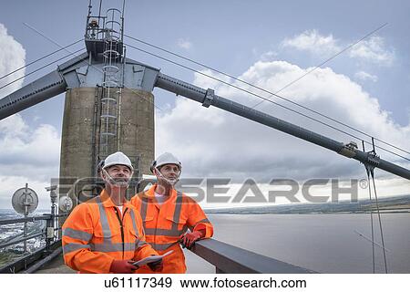 Bridge workers on top of suspension bridge. The Humber Bridge, UK was built in 1981 and at the time was the world's largest single-span suspension bridge View Large Photo Image Stock Photo - Bridge workers on top of suspension bridge. The Humber Bridge, UK was built in 1981 and at the time was the world's largest single-span suspension bridge. Fotosearch