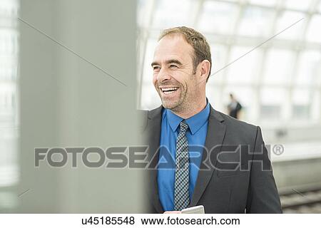 Stock Photo - Businessman laughing. Fotosearch