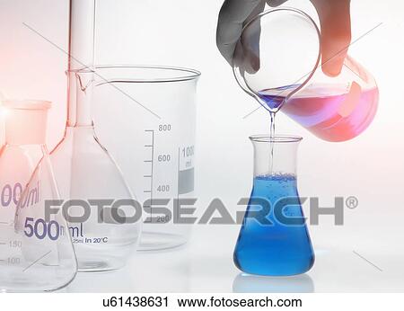Chemical in a conical flask View Large Photo Image Stock Image - Chemical in a conical flask. Fotosearch