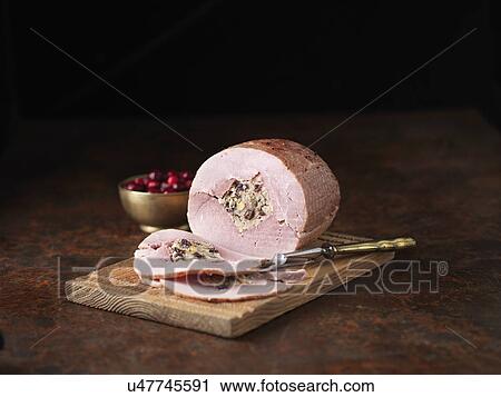 Christmas dinner. British Wiltshire ham with orange and cranberry stuffing and cranberries View Large Photo Image Stock Image - Christmas dinner. British Wiltshire ham with orange and cranberry stuffing and cranberries. Fotosearch