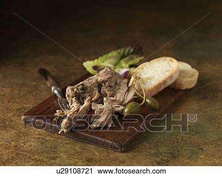 Christmas snack of pork rillette with ciabatta, green salad leaves and caper berries View Large Photo Image Stock Image - Christmas snack of pork rillette with ciabatta, green salad leaves and caper berries. Fotosearch