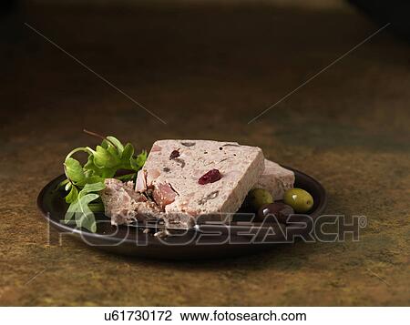 Christmas snack of smoked ham turkey & chicken terrine with cranberries. Rocket mixed salad leaves with green and black olives View Large Photo Image Stock Image - Christmas snack of smoked ham turkey & chicken terrine with cranberries. Rocket mixed salad leaves with green and black olives. Fotosearch