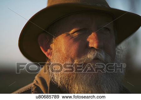 Close-up of farmer outdoors View Large Photo Image Stock Photo - Close-up of farmer outdoors. Fotosearch
