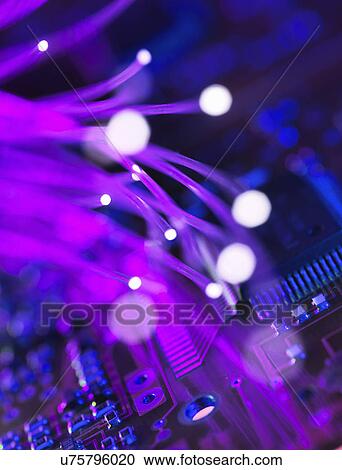 Close up of fibre optics carrying data passing a circuit board View Large Photo Image Stock Image - Close up of fibre optics carrying data passing a circuit board. Fotosearch