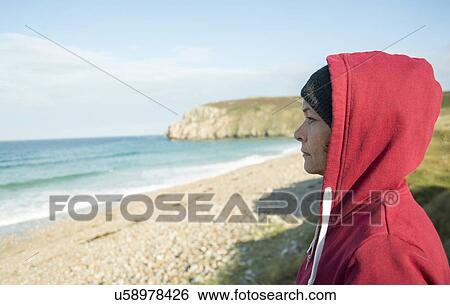 Close up of mature woman gazing at sea view, Camaret-sur-mer, Brittany, France View Large Photo Image Stock Photograph - Close up of mature woman gazing at sea view, Camaret-sur-mer, Brittany, France. Fotosearch