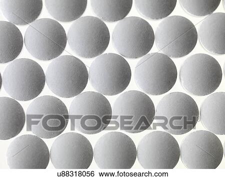 Close up of white pills View Large Photo Image Stock Photograph - Close up of white pills. Fotosearch