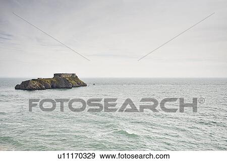 Distant view of St Catherines Island and fort, Tenby, Wales View Large Photo Image Stock Photo - Distant view of St Catherines Island and fort, Tenby, Wales. Fotosearch