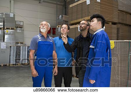 Factory workers with supervisor View Large Photo Image Stock Photograph - Factory workers with supervisor. Fotosearch