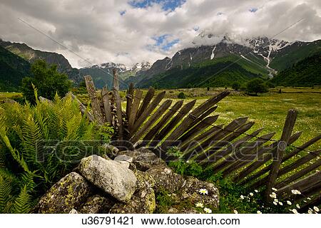 Fence and distant mountains, Mazeri village, Svaneti, Georgia View Large Photo Image Stock Image - Fence and distant mountains, Mazeri village, Svaneti, Georgia. Fotosearch