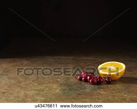 Festive Christmas ingredients of orange and cranberry for stuffing pork View Large Photo Image Stock Image - Festive Christmas ingredients of orange and cranberry for stuffing pork. Fotosearch