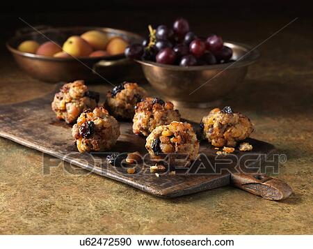 Festive Christmas ingredients of pork, apricot & jumbo flamed raisin stuffing with red grapes and apricots View Large Photo Image Stock Image - Festive Christmas ingredients of pork, apricot & jumbo flamed raisin stuffing with red grapes and apricots. Fotosearch