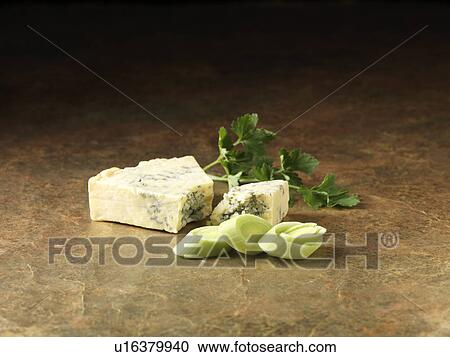 Festive Christmas ingredients of sliced leeks, stilton cheese and coriander for pork and wild mushroom stuffing View Large Photo Image Stock Image - Festive Christmas ingredients of sliced leeks, stilton cheese and coriander for pork and wild mushroom stuffing. Fotosearch
