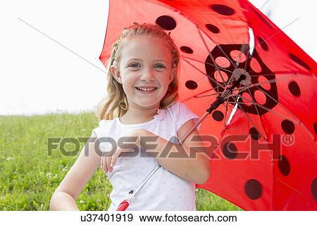 Stock Photo - Girl with umbrella. Fotosearch