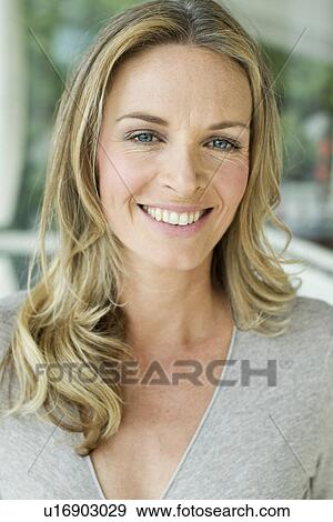 Mature blonde woman, close up portrait View Large Photo Image Stock Photo - Mature blonde woman, close up portrait. Fotosearch