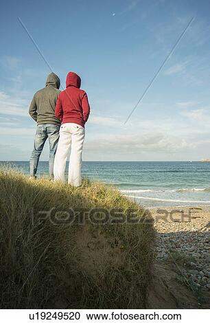 Mature couple gazing at sea view, Camaret-sur-mer, Brittany, France View Large Photo Image Stock Image - Mature couple gazing at sea view, Camaret-sur-mer, Brittany, France. Fotosearch