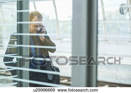 Mature man on cell phone View Large Photo Image Stock Photo - Mature man on cell phone. Fotosearch