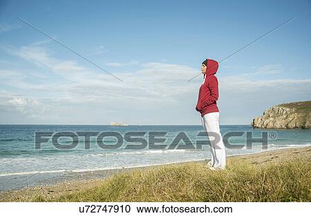 Mature woman gazing at sea view, Camaret-sur-mer, Brittany, France View Large Photo Image Stock Image - Mature woman gazing at sea view, Camaret-sur-mer, Brittany, France. Fotosearch