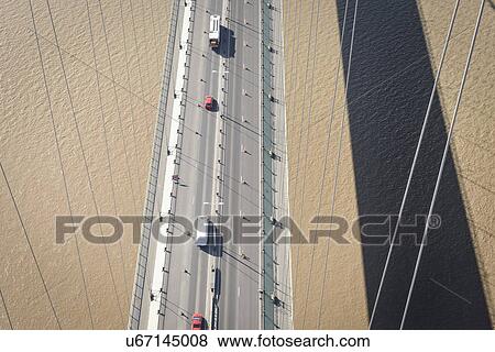 Stock Photo - Overhead view of roadway on suspension bridge. The Humber Bridge, UK was built in 1981 and at the time was the world's largest single-span suspension bridge. Fotosearch