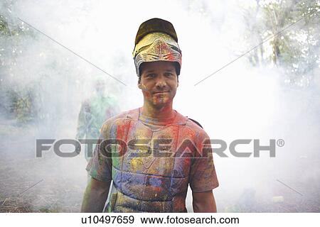 Paintball player in paintball wear marked with paint View Large Photo Image Stock Photo - Paintball player in paintball wear marked with paint. Fotosearch
