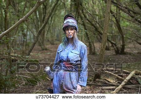 Paintball player in paintball wear marked with paint View Large Photo Image Stock Photo - Paintball player in paintball wear marked with paint. Fotosearch