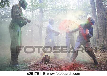 Paintball players in action View Large Photo Image Stock Photo - Paintball players in action. Fotosearch