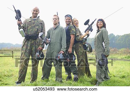 Paintball team in a field View Large Photo Image Stock Image - Paintball team in a field. Fotosearch