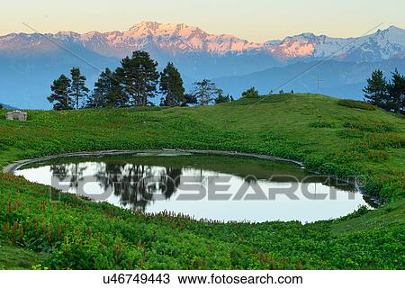 Stock Image - Pond and Ushba mountain, Mazeri village, Svaneti, Georgia. Fotosearch