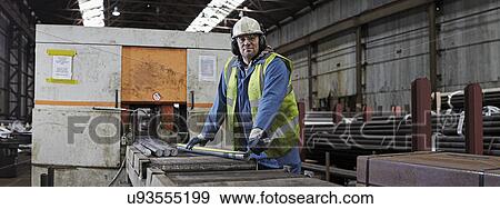 Stock Photo - Portrait of a steelworker in his working environment. Fotosearch