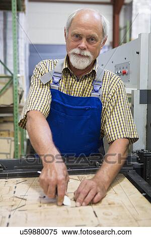 Stock Photography - Portrait of factory worker. Fotosearch