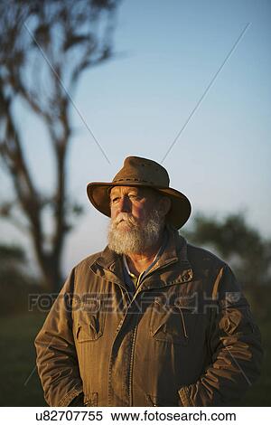 Stock Photography - Portrait of farmer outdoors. Fotosearch