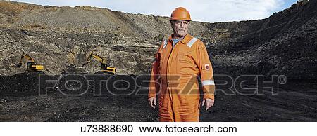 Portrait of mature quarry worker in quarry site View Large Photo Image Stock Image - Portrait of mature quarry worker in quarry site. Fotosearch