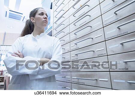 Picture - Portrait of pharmacist in pharmacy. Fotosearch