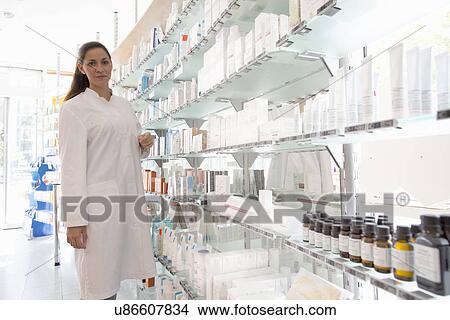 Picture - Portrait of pharmacist in pharmacy. Fotosearch