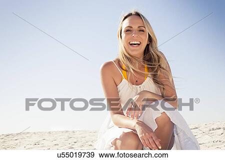 Portrait of smiling mid adult woman on beach, Cape Town, Western Cape, South Africa View Large Photo Image Stock Photo - Portrait of smiling mid adult woman on beach, Cape Town, Western Cape, South Africa. Fotosearch
