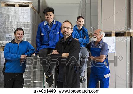 Portrait of team of factory workers View Large Photo Image Stock Photo - Portrait of team of factory workers. Fotosearch