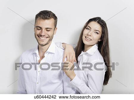 Stock Image - Portrait of young business couple. Fotosearch