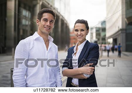 Portrait of young business partners on street, London, UK View Large Photo Image Stock Image - Portrait of young business partners on street, London, UK. Fotosearch