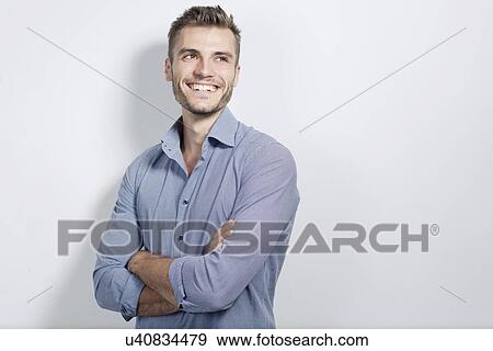 Stock Photo - Portrait of young businessman. Fotosearch