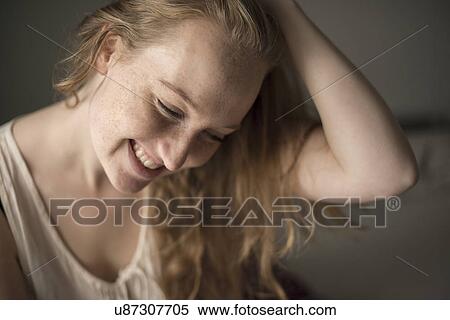 Portrait of young woman with freckles laughing View Large Photo Image Stock Photography - Portrait of young woman with freckles laughing. Fotosearch