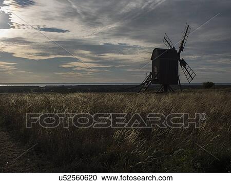Stock Image - Silhouetted windmill, Oland, Sweden. Fotosearch