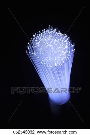 Static upright illuminated strands of fiber optic light View Large Photo Image Stock Image - Static upright illuminated strands of fiber optic light. Fotosearch