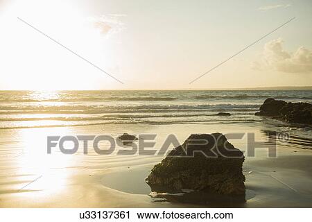 Stock Image - View of beach, rocks and coastline, Camaret-sur-Mer, Brittany, France. Fotosearch