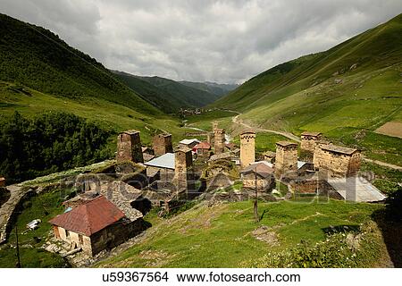 Picture - View of old ruined Svanetian towers in valley, Ushguli village, Svaneti, Georgia. Fotosearch