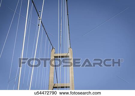 Stock Image - View of the top of suspension bridge. The Humber Bridge, UK was built in 1981 and at the time was the world's largest single-span suspension bridge. Fotosearch