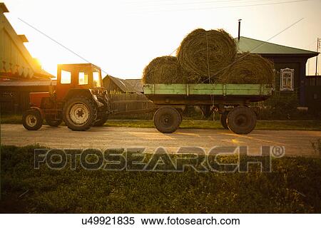 Stock Photography - Wagon load of bales of hay, Sarsy village, Sverdlovsk region, Russia. Fotosearch