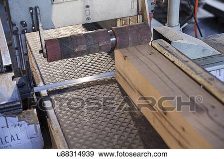 Stock Photo - Wood block on conveyor in factory, Jiangsu, China. Fotosearch
