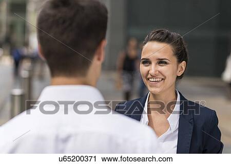 Young businesswoman and man meeting, London, UK View Large Photo Image Stock Image - Young businesswoman and man meeting, London, UK. Fotosearch