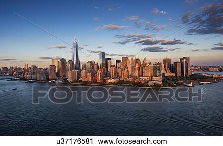 Aerial view of city with Freedom tower at sunset View Large Photo Image Stock Image - Aerial view of city with Freedom tower at sunset. Fotosearch