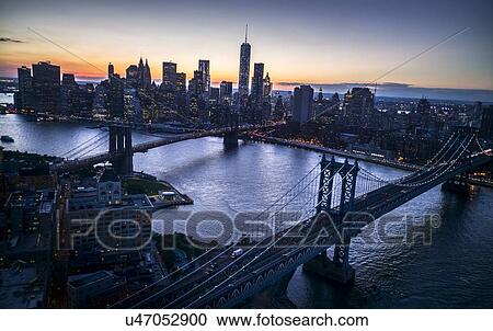 Aerial view of city with Freedom tower at sunset View Large Photo Image Stock Image - Aerial view of city with Freedom tower at sunset. Fotosearch