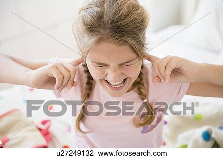 Angry girl (12-13) in bedroom View Large Photo Image Stock Image - Angry girl (12-13) in bedroom. Fotosearch